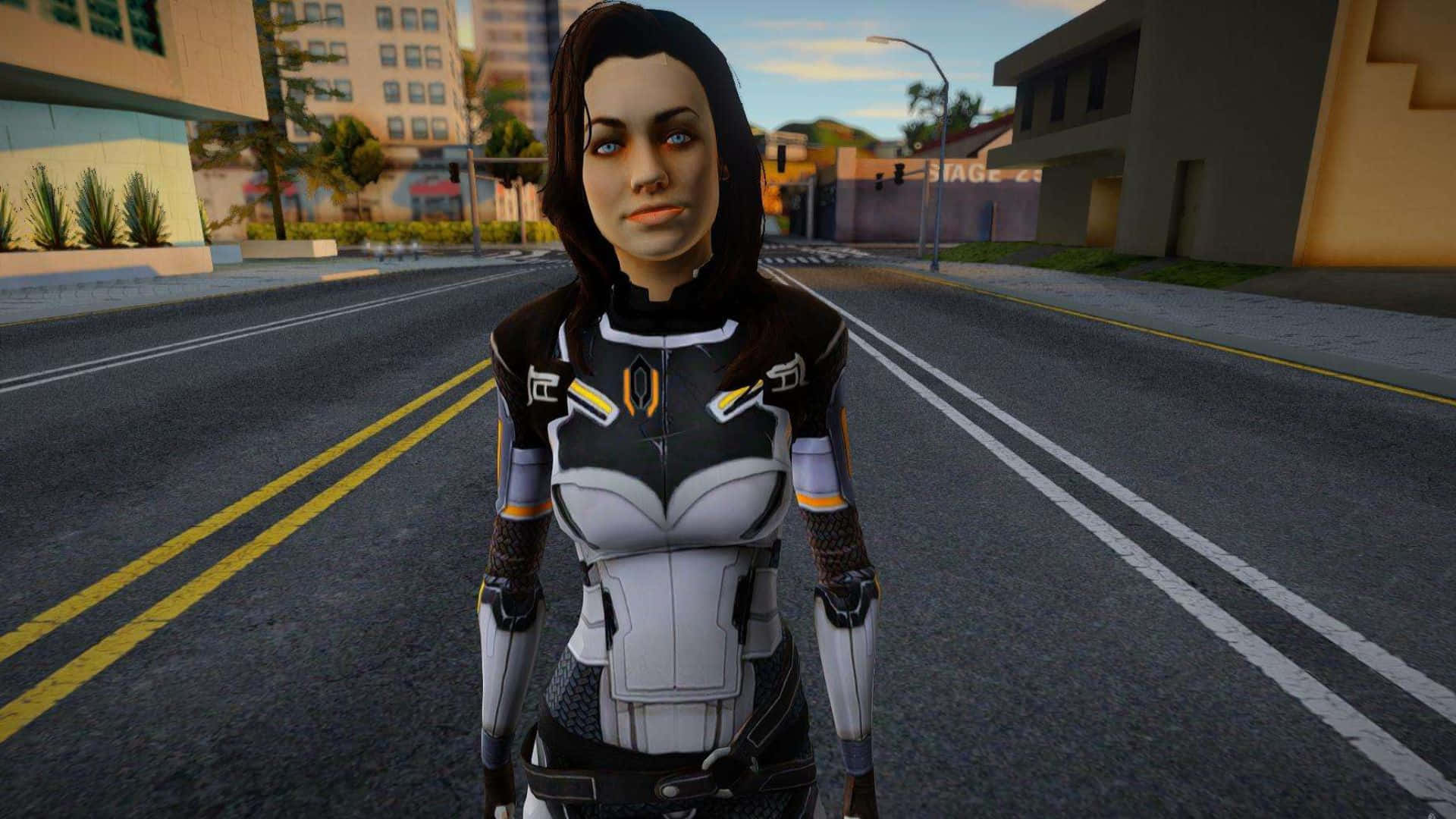 Miranda Lawson 桌布 壁紙 — 一個穿著未來風格盔甲的女性角色站在城市街道中央，背景是夕陽、建築物和棕櫚樹。