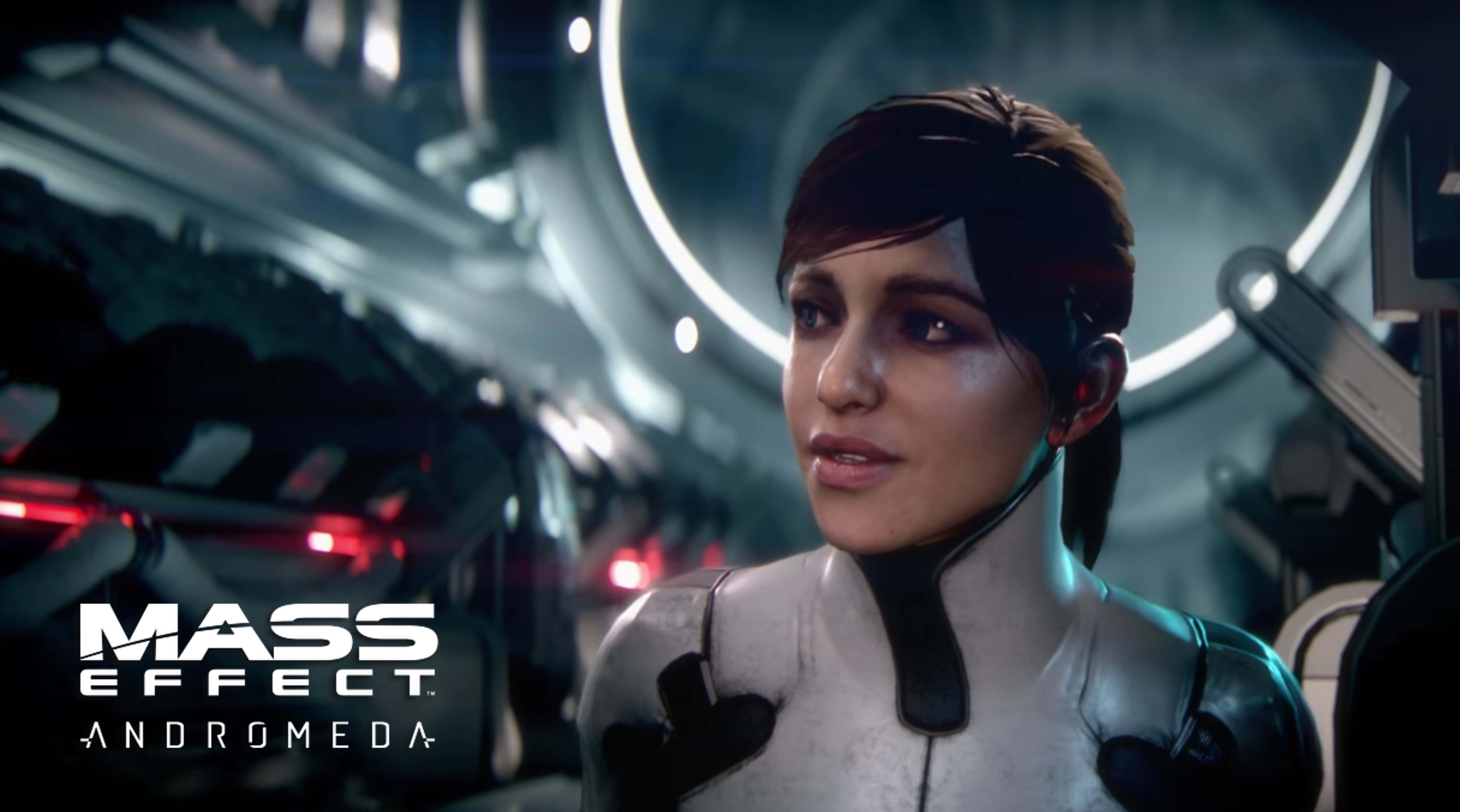 Mass Effect Andromeda 桌布 壁紙 — 一名身穿未來裝甲的女兵站在高科技太空船走廊，周圍有發光的圓形燈光和紅色緊急指示燈。