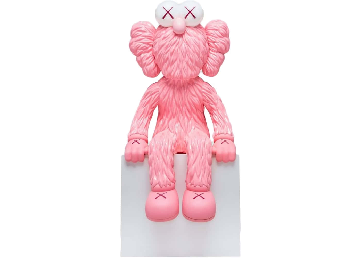  壁紙 — 一個粉紅色的KAWS Companion公仔，有X形眼睛，靜靜地坐在白色底座上，背景是純白色。