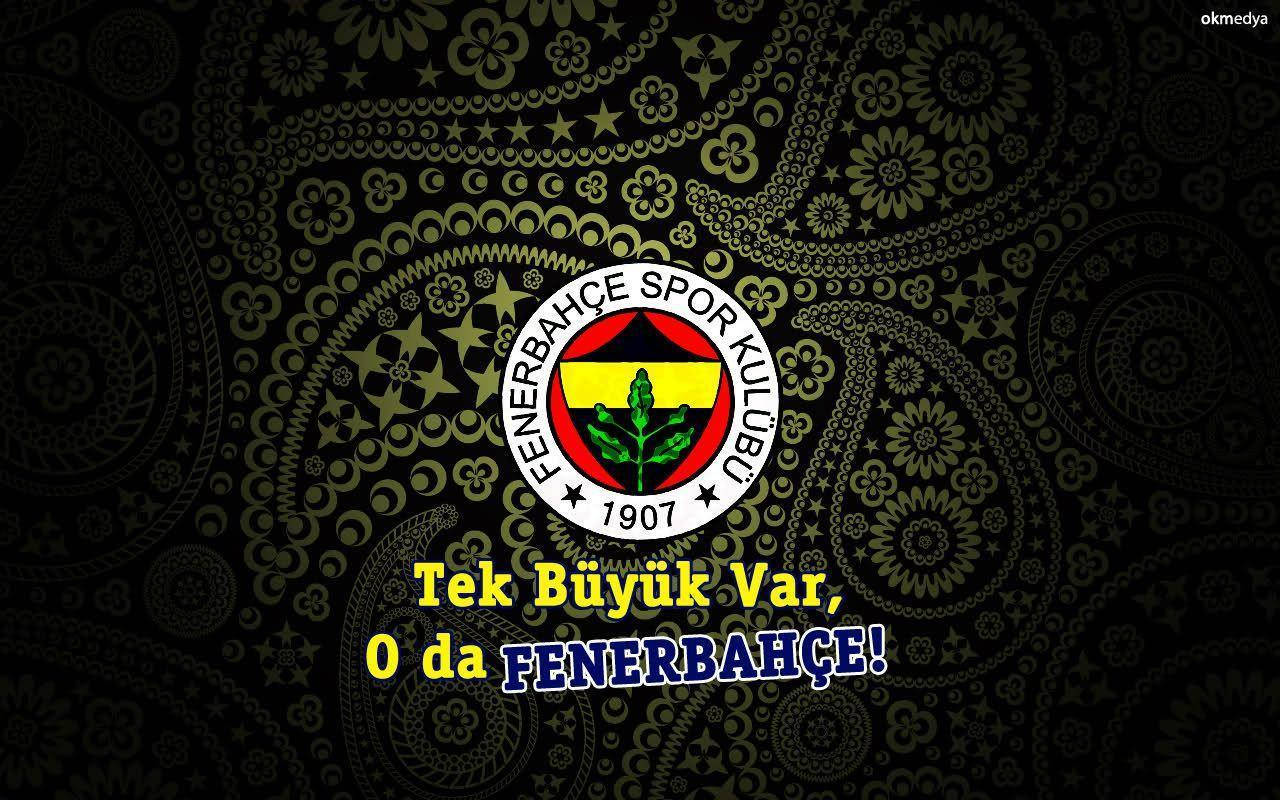 Fenerbahce 桌布 壁紙 — Fenerbahçe Spor Kulübü 標誌居中於黑色背景上，帶有複雜的金色佩斯利圖案和粗體黃藍色文字。