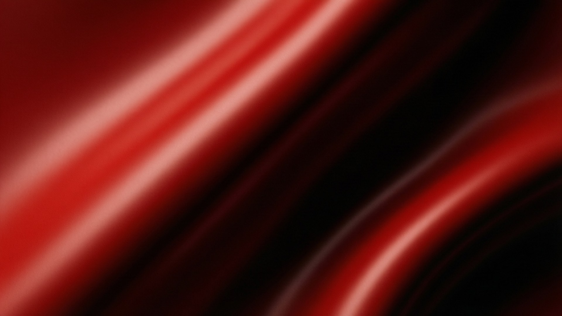 Red Surface Shadow 壁紙 — 豐富的紅色緞面布料以平滑的對角波浪流動，帶有明亮的高光和深邃的陰影。