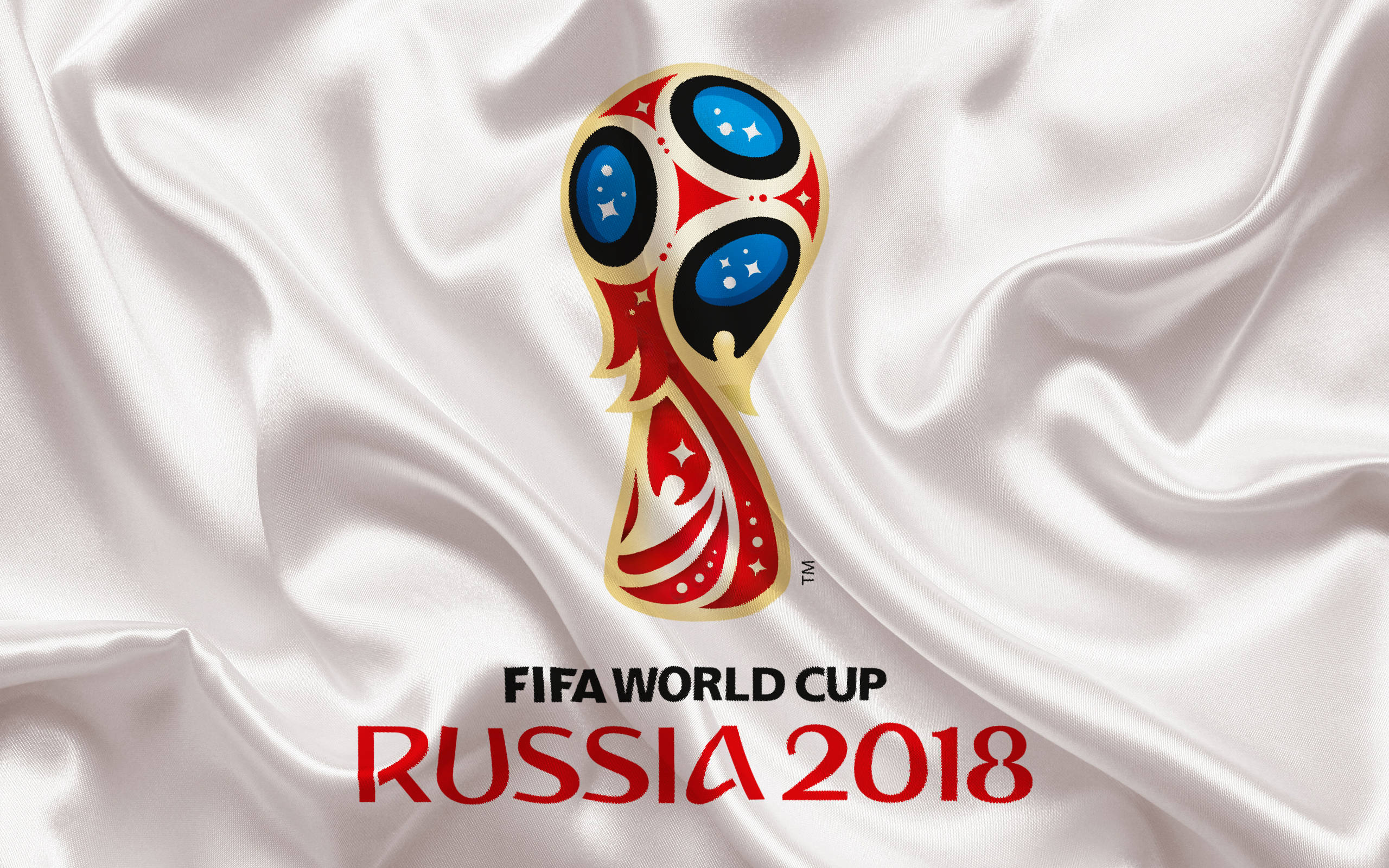 World 桌布 壁紙 — FIFA世界盃俄羅斯2018標誌在豪華白色緞面背景上閃耀著紅、金、藍色。