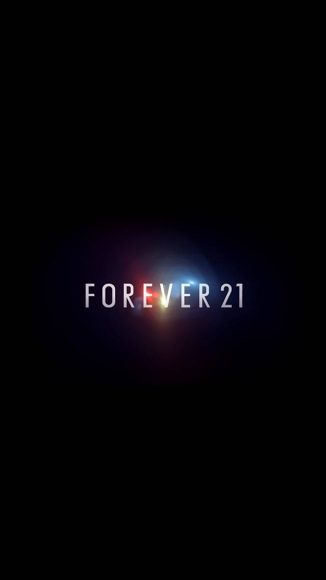 永遠21 桌布 壁紙 — Forever 21 標誌在黑色背景上發出紅色和藍色的光芒。