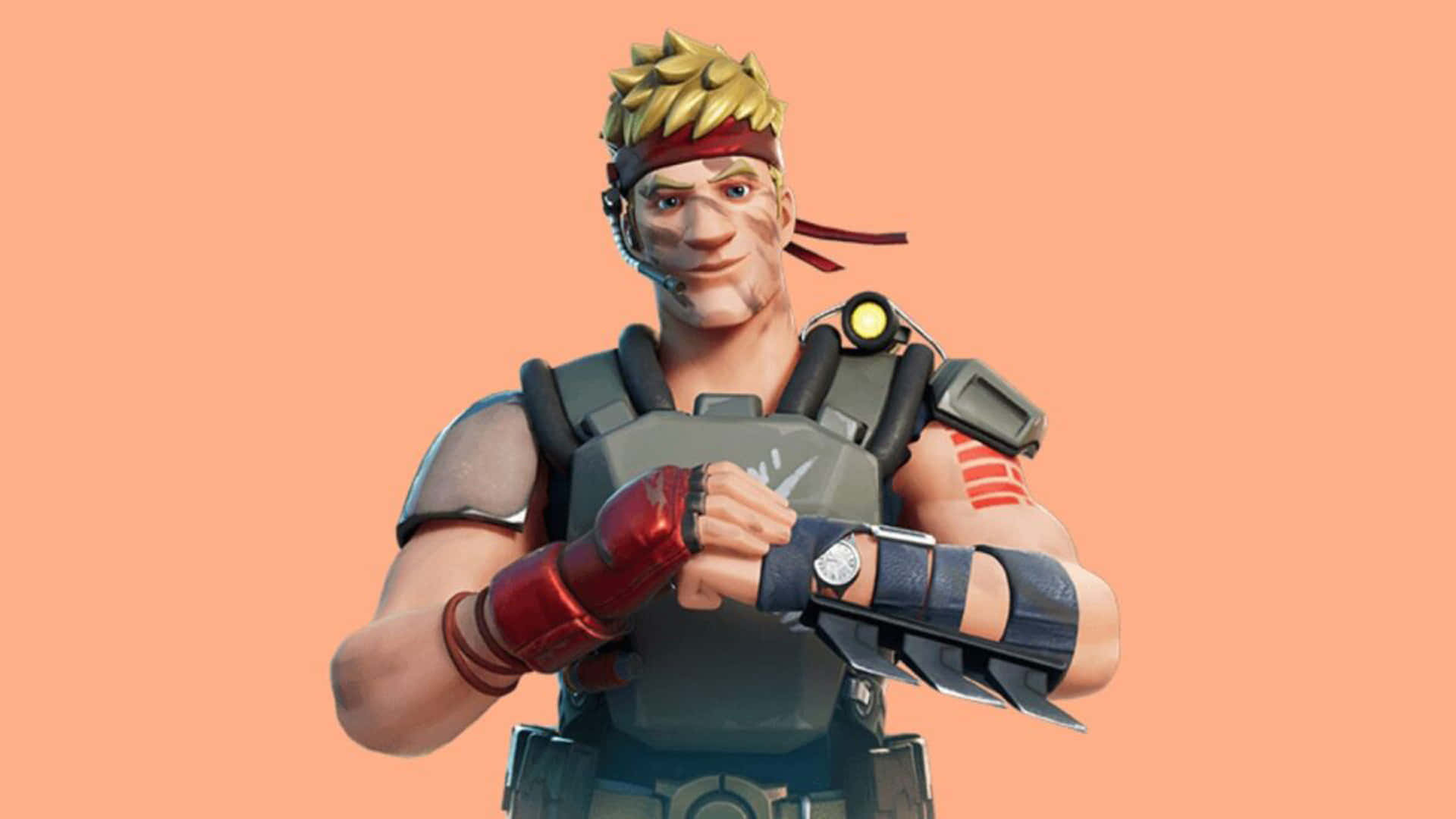  壁紙 — 一個Fortnite角色，有著尖刺金髮和紅色頭帶，在純桃色背景前穿著戰術裝備調整手錶。