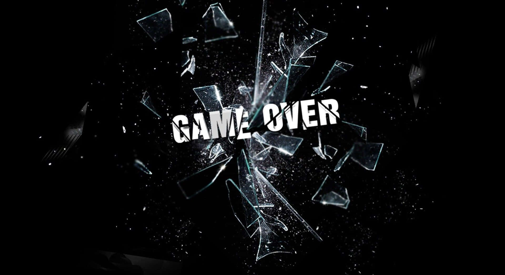 Dark Game Over 桌布 壁紙 — 「GAME OVER」字樣穿破碎玻璃，在黑色背景上碎片飛濺。