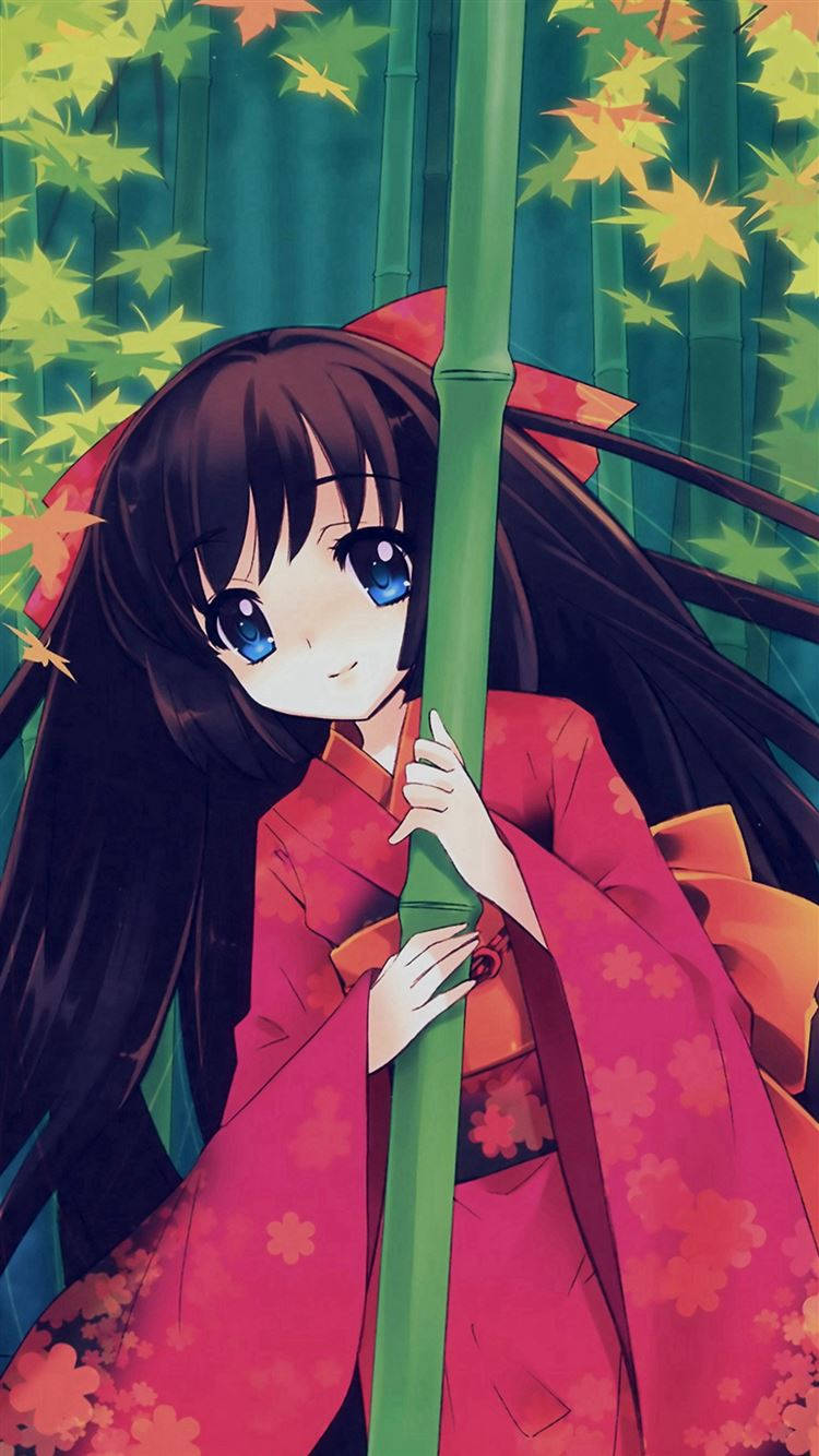 穿紅色和服的動漫女孩在秋林中手持竹子。
