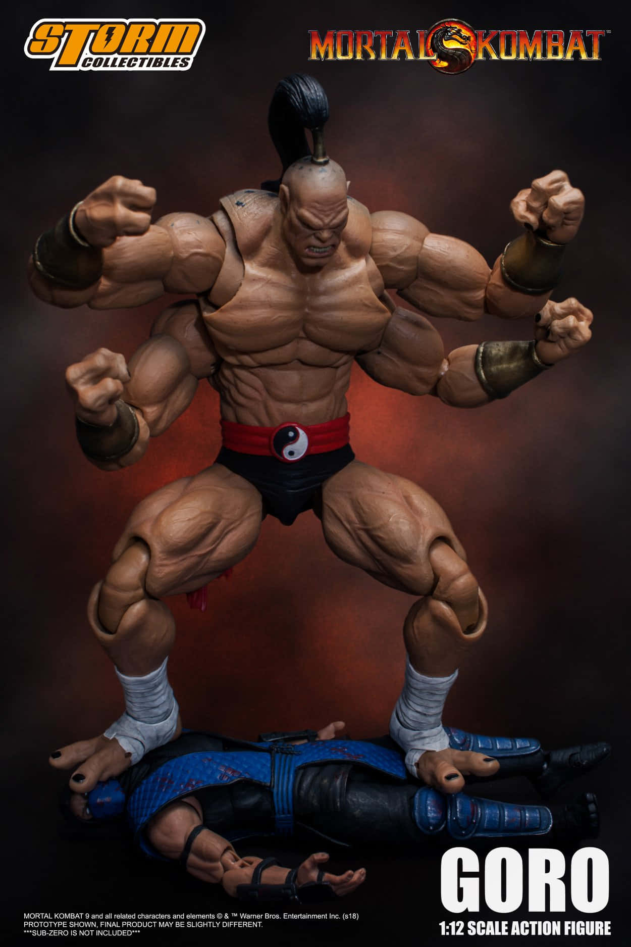Mortal Kombat Goro 桌布 壁紙 — 一個來自《真人快打》的肌肉發達 Goro 動作人偶，在深紅色背景前勝利地站在被擊敗的對手之上。