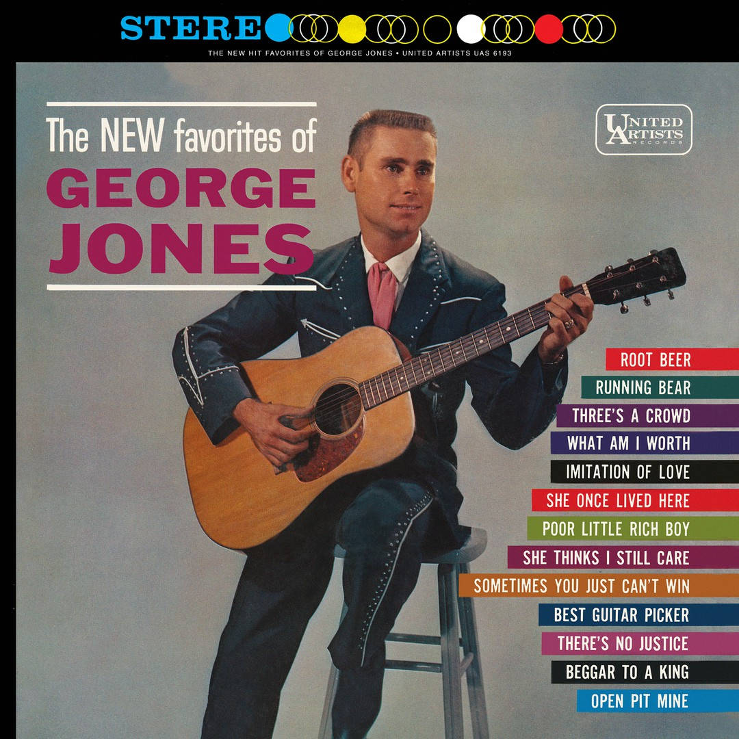 artist 桌布 壁紙 — George Jones 身穿飾有鉚釘的藍色西裝，在復古專輯封面上抱著一把原聲吉他，歌曲標題以彩色方塊呈現。