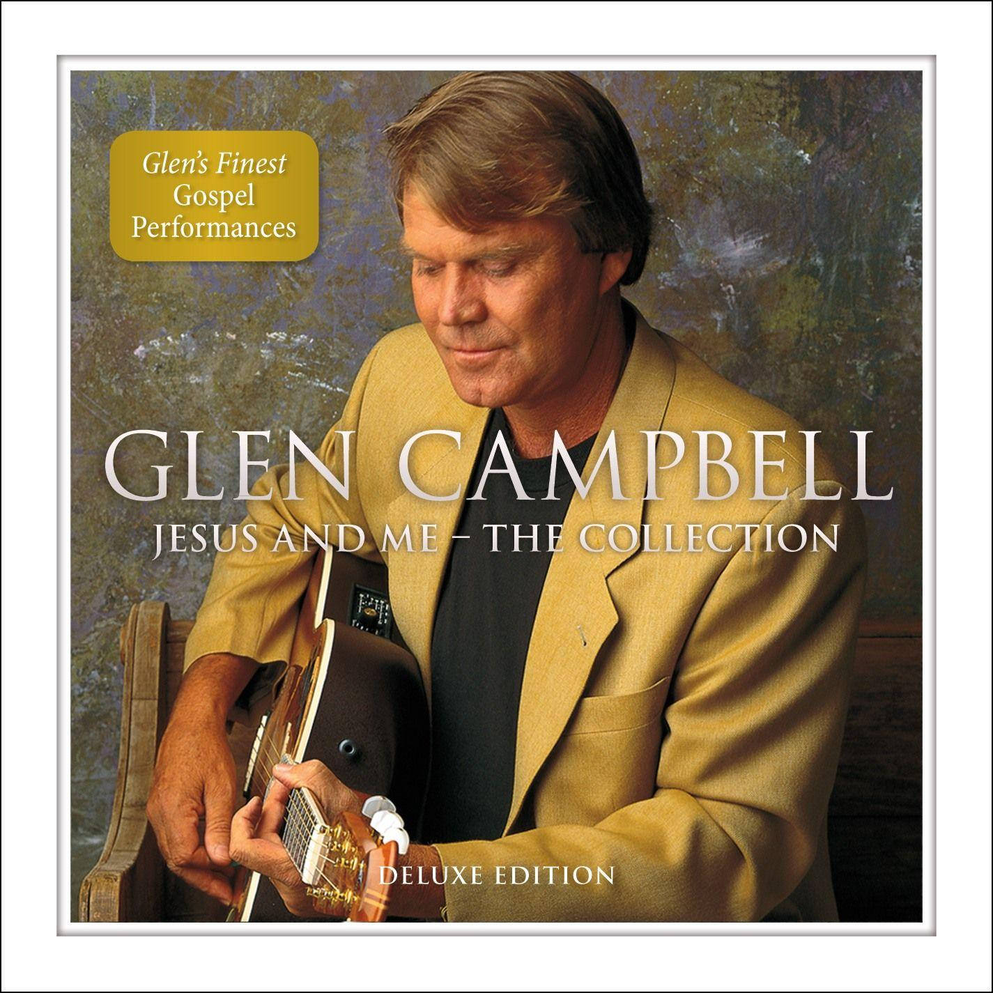 吉他動圖 桌布 壁紙 — Glen Campbell 身穿棕褐色西裝，在帶有紋理的背景前專注地彈奏原聲吉他。