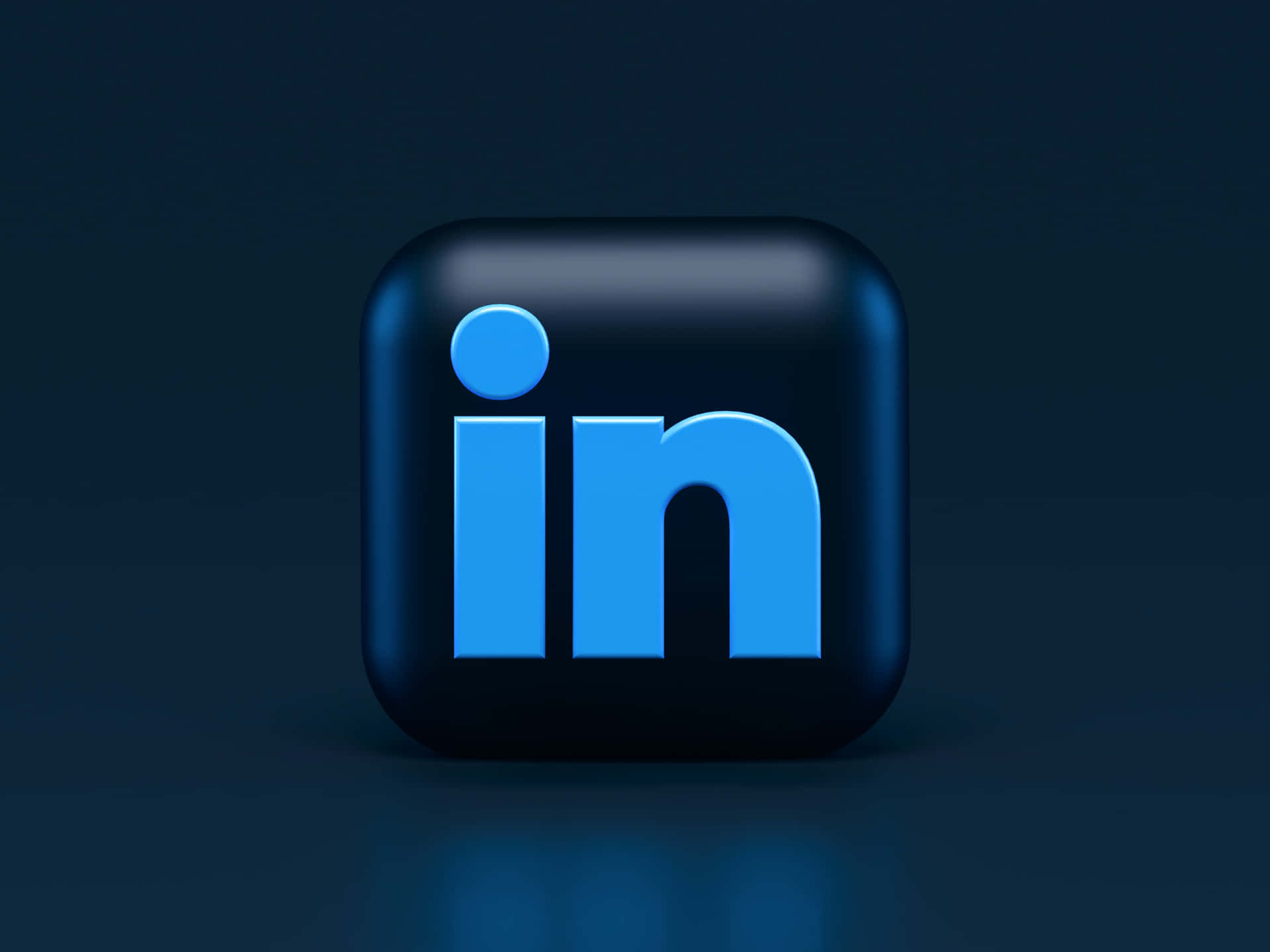 深色背景上帶有藍色字母的 LinkedIn 應用程式圖示 — 3D 壁紙