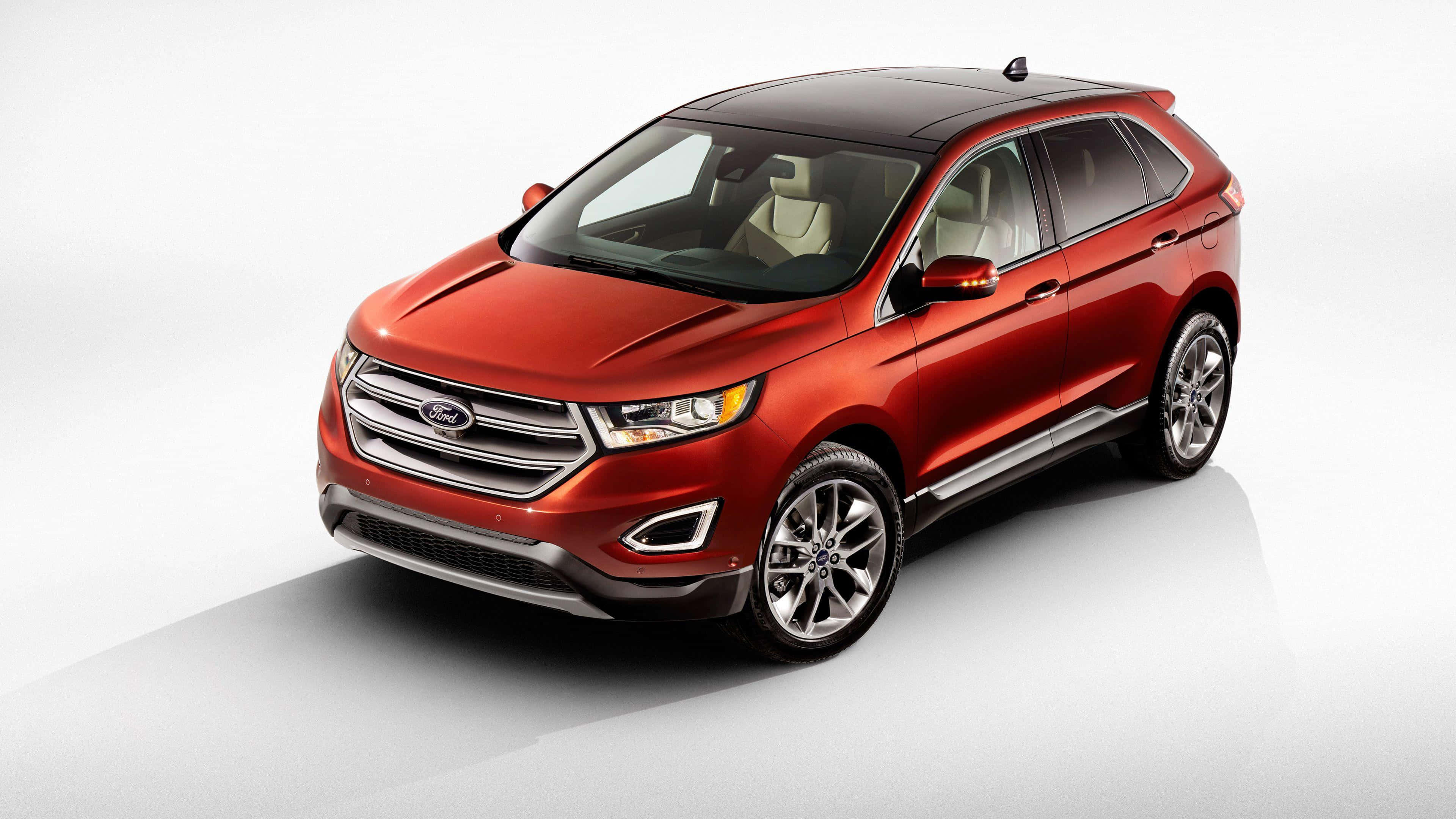 Ford Edge 桌布 壁紙 — 一輛光澤的紅色福特Edge SUV從高角度拍攝，背景是乾淨的白色攝影棚，帶有柔和陰影。