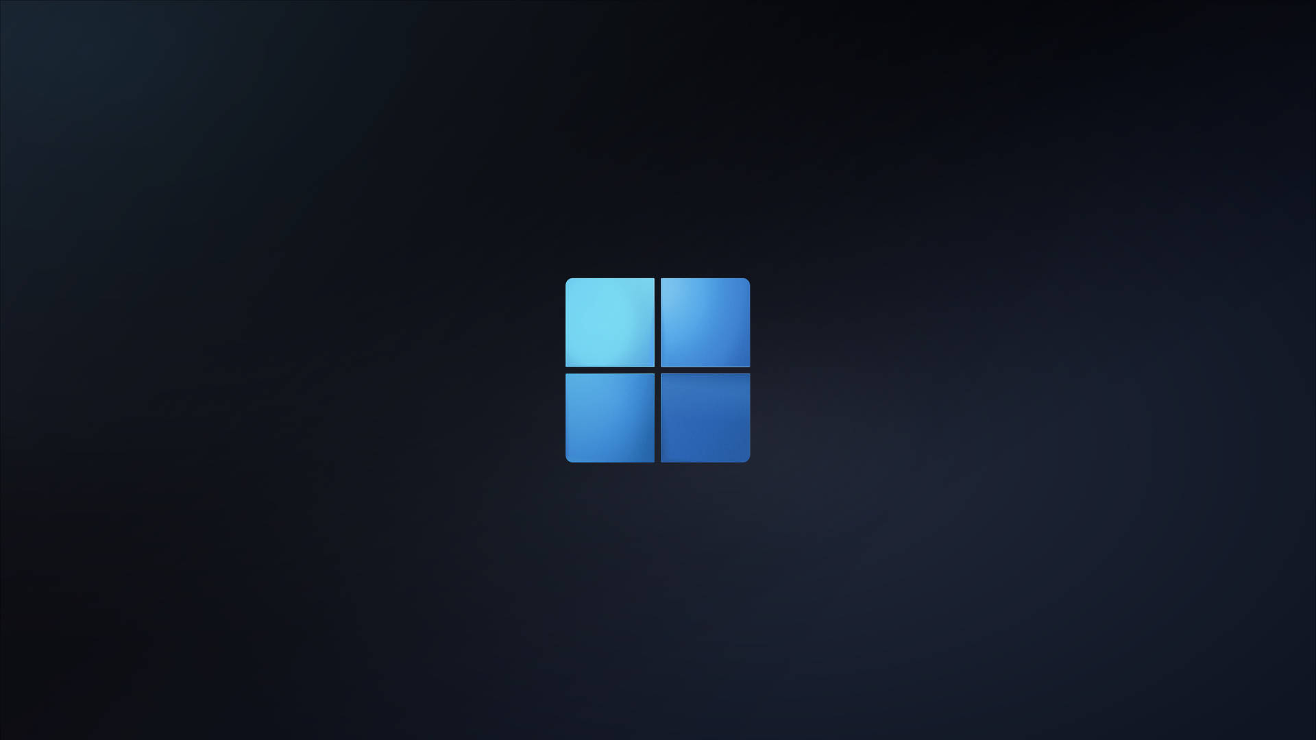 Windows標誌在深色漸變背景上發出藍光 — Windows 11 壁紙