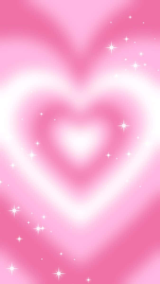 Pink Heart Aura 桌布 壁紙 — 一個發光的粉紅色心形，帶有同心層和閃爍的星星，在漸變背景上散發出柔和的光芒。