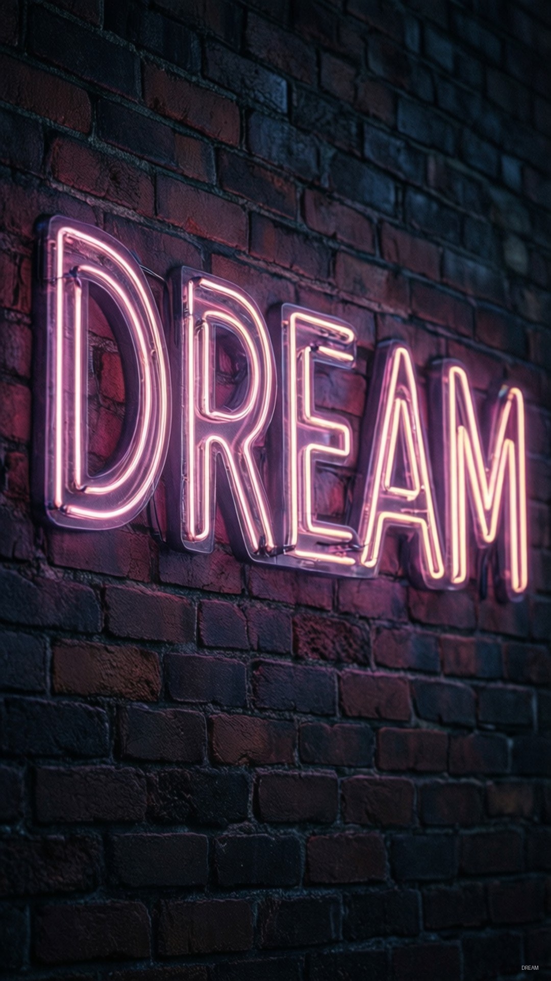 安裝在深色磚牆上的粉紅色霓虹燈牌，上面寫著dream — iPad 壁紙