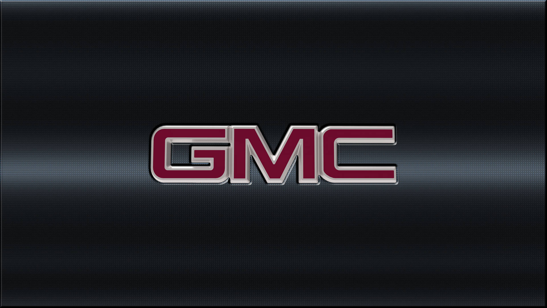 深色紋理背景上的 GMC 汽車標誌 — Valorant Logo 壁紙