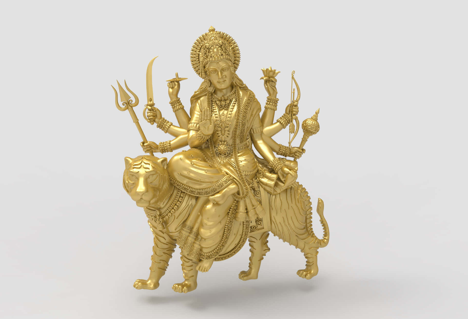  壁紙 — 金色多臂女神杜爾迦騎虎雕像，背景為純白色。