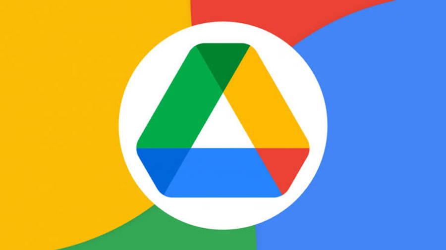 Google Drive 桌布 壁紙 — Google Drive 標誌居中於白色圓圈內，背景為黃、紅、藍、綠曲線形狀的鮮豔抽象圖案。