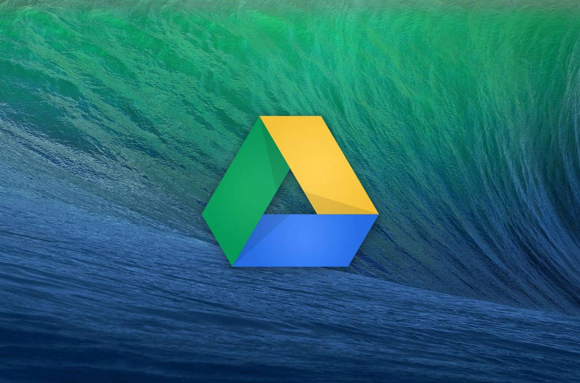 Software 桌布 壁紙 — Google Drive 標誌漂浮在一個巨大的藍綠色海浪中央，帶有深藍色的暗流。