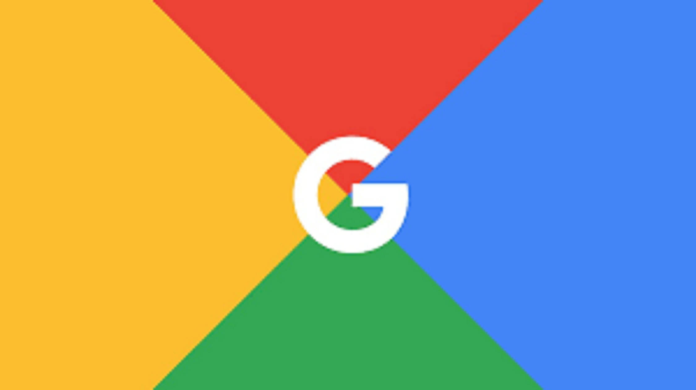 google 桌布 壁紙 — Google 標誌居中於由紅色、黃色、綠色和藍色三角形組成的鮮豔幾何背景上。