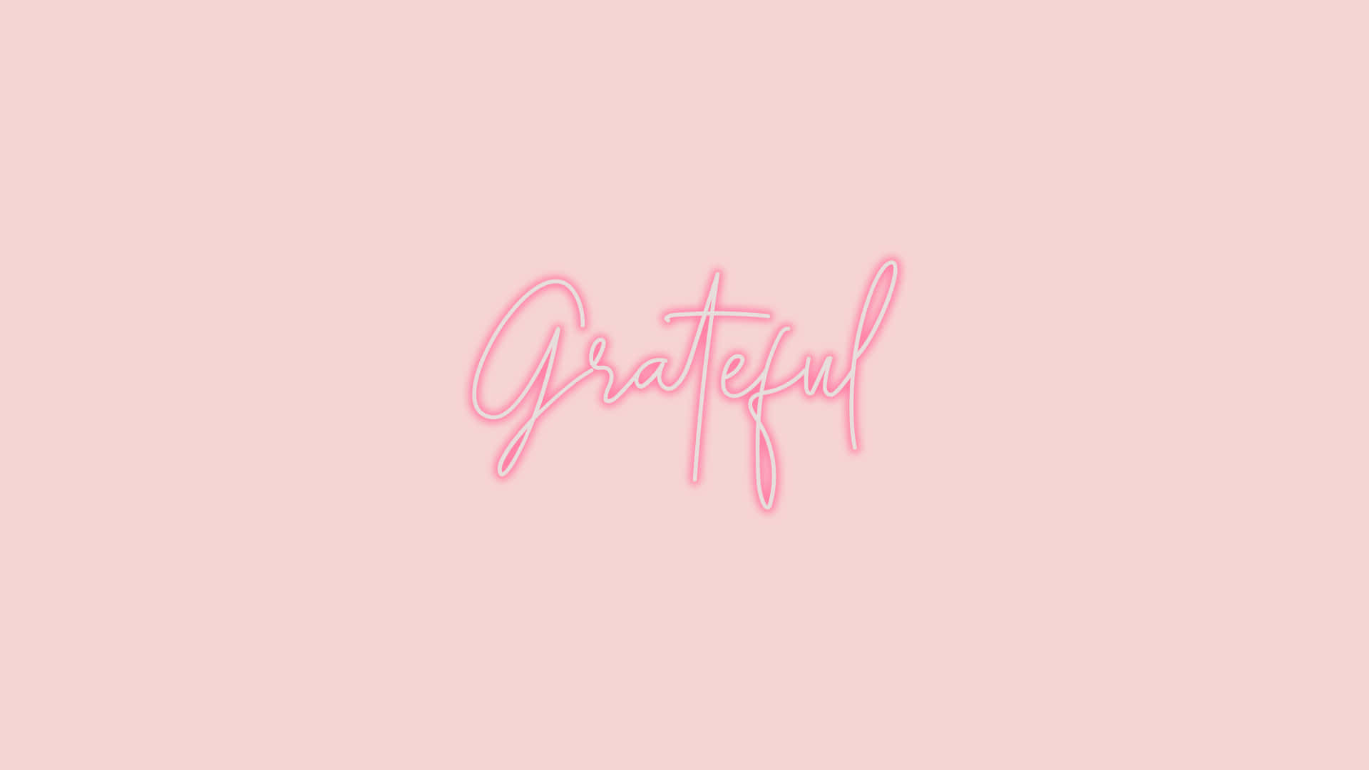 Blush Pink 桌布 壁紙 — 「Grateful」一詞以柔和粉紅霓虹字體在淡粉紅背景上發光。