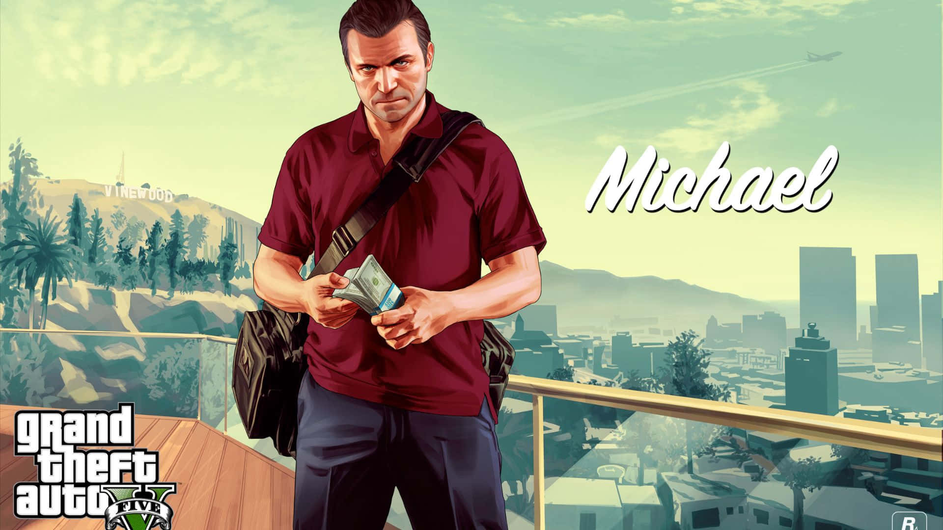 Grand Theft Auto V 桌布 壁紙 — 《GTA V》的Michael De Santa站在屋頂陽台上數錢，背景是城市天際線和好萊塢標誌。