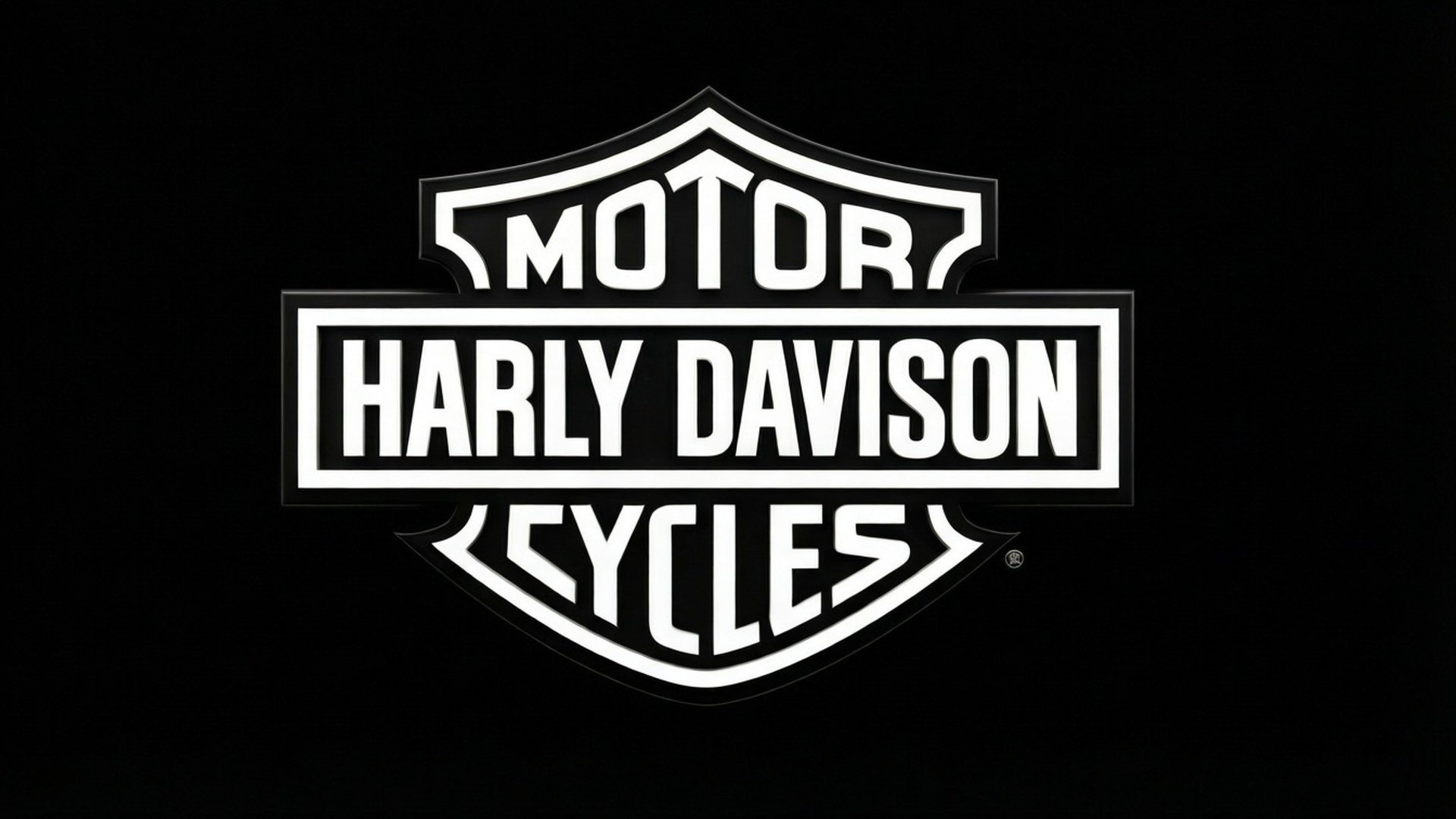 Minimalist Black White 壁紙 — 標誌性的白色Harley-Davidson標誌以粗體字在純黑色背景上突出顯示。