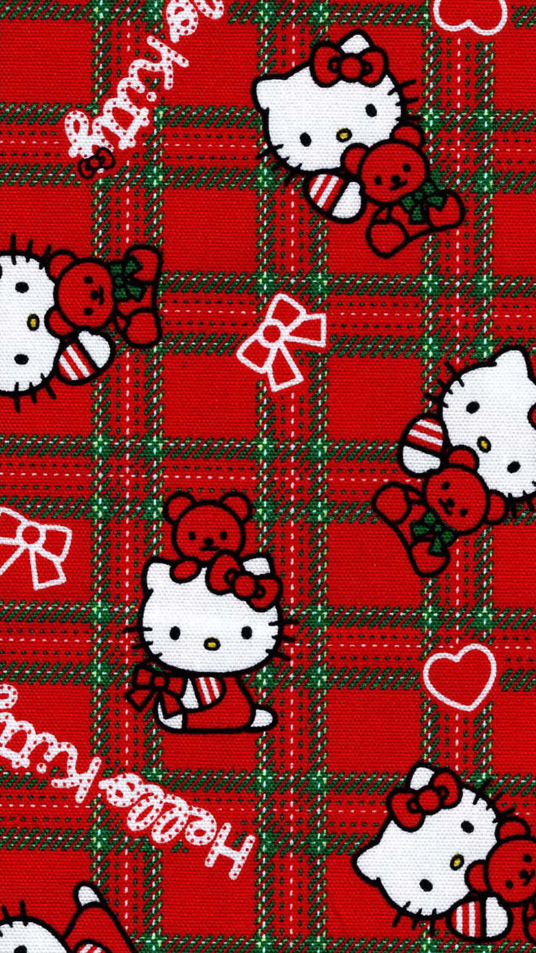  壁紙 — Hello Kitty 角色以紅色格子圖案配上蝴蝶結和泰迪熊，印在節日布料上。