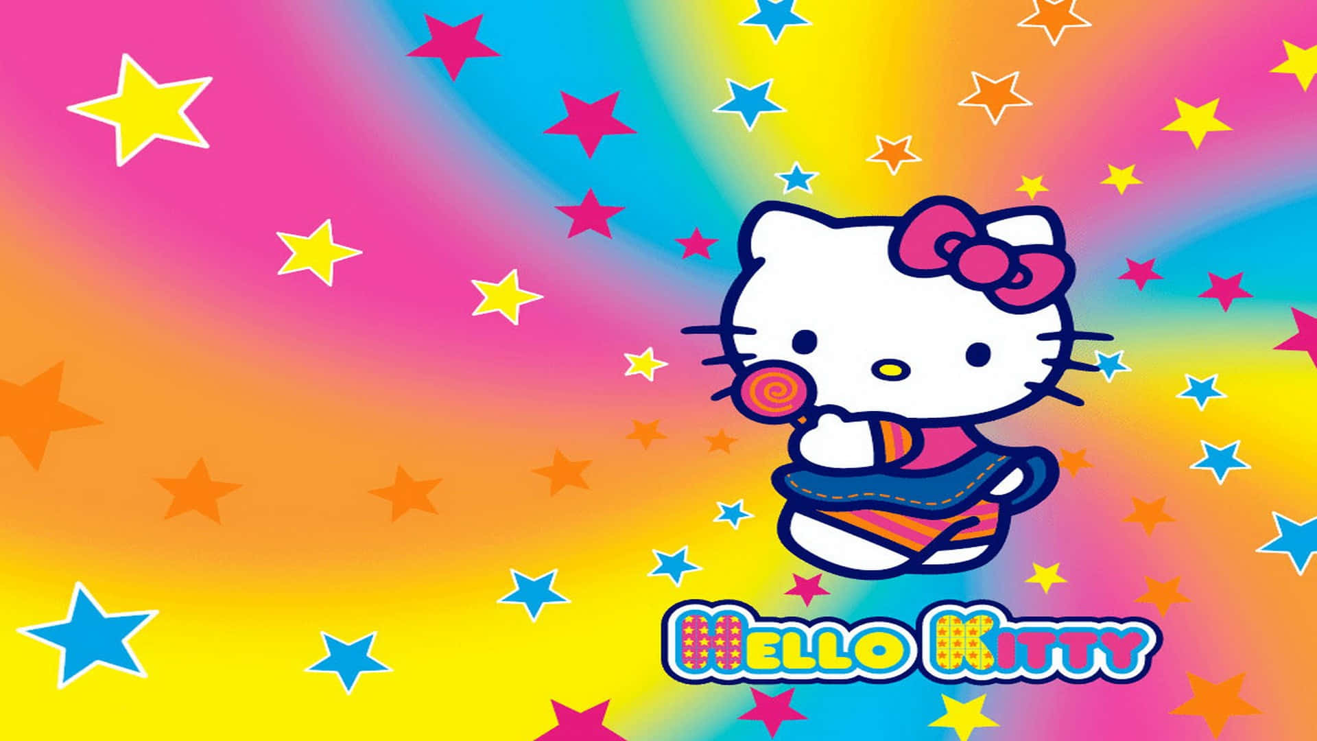 Hello Kitty 在彩虹背景上被彩色星星包圍著拿著一支棒棒糖。 — Hello Kitty 壁紙