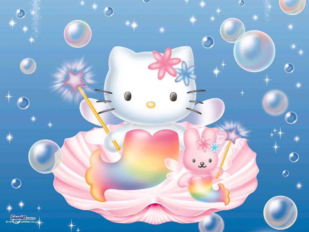 Hello 桌布 壁紙 — Hello Kitty 和一隻粉紅色兔子像美人魚一樣坐在一個巨大的粉紅色貝殼中，周圍有氣泡和星星，背景是藍色。