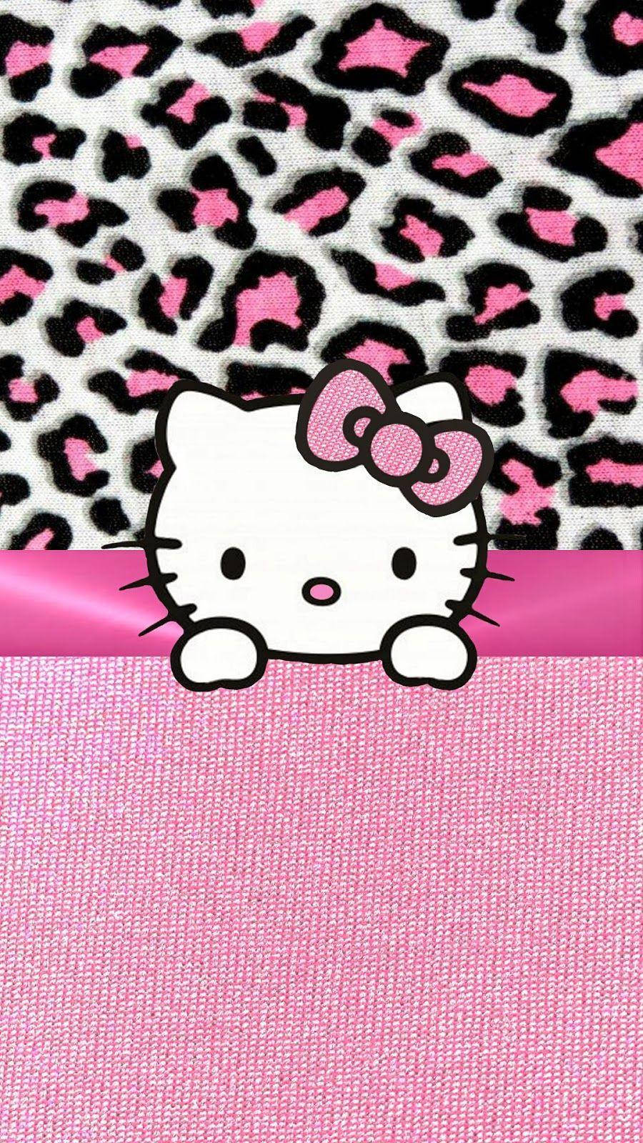 Pink Hello Kitty 桌布 壁紙 — Hello Kitty 在粉紅色和黑色的豹紋背景上，從粉紅色絲帶上方偷看。