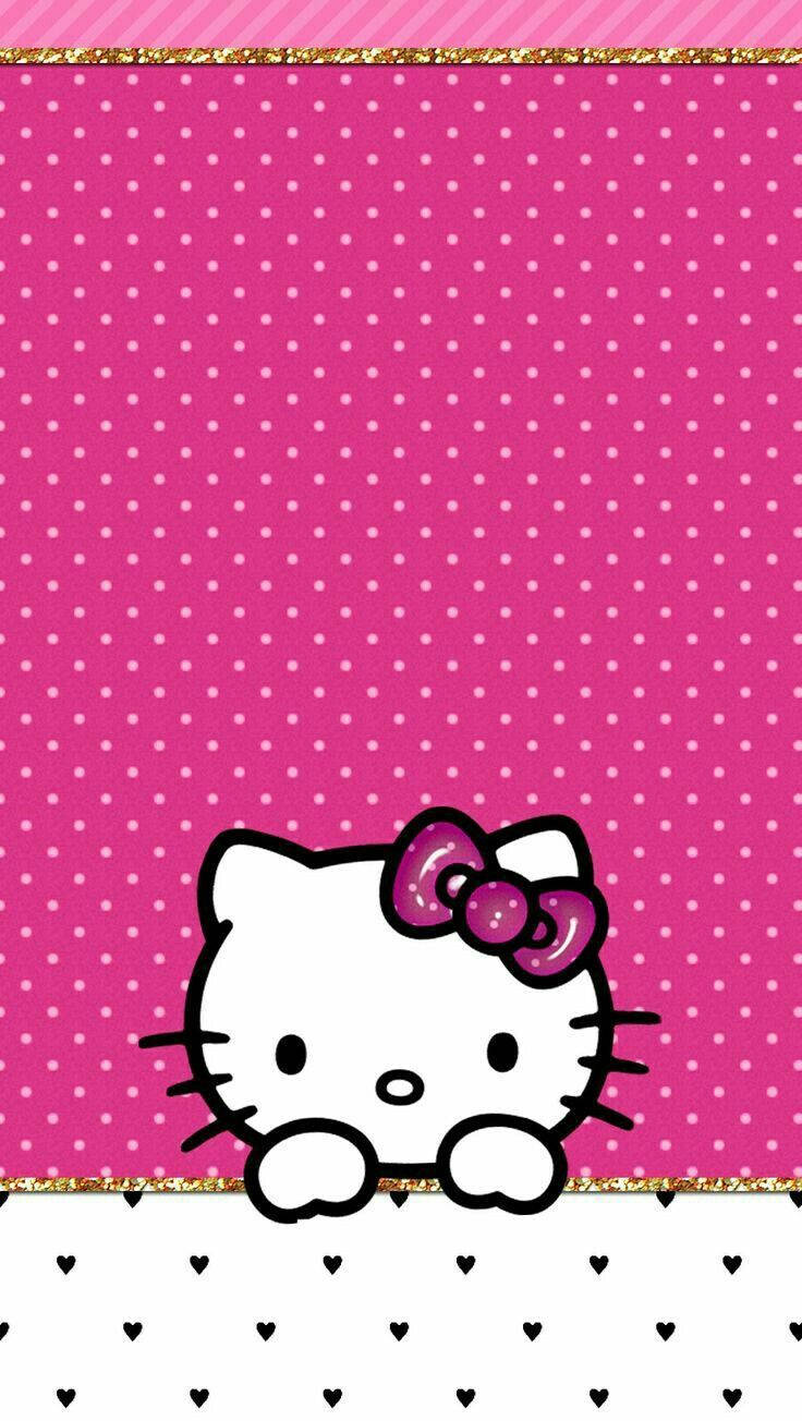 Hello Kitty 桌布 壁紙 — Hello Kitty 在粉紅色圓點背景上，從金色閃粉邊框上方探出頭來，下方有黑色心形圖案。