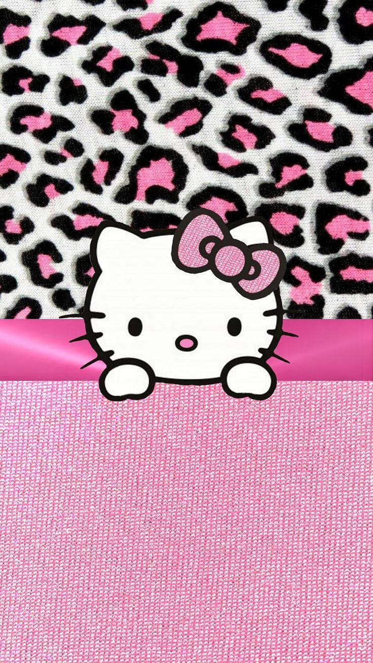 sanrio 桌布 壁紙 — Hello Kitty 在粉紅色黑色豹紋背景上，從粉紅色絲帶後面探出頭來。