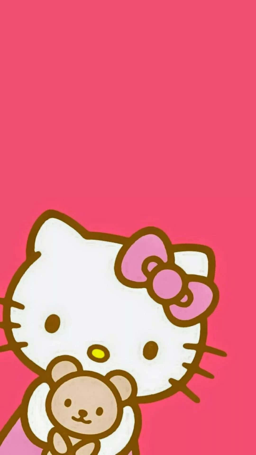 Hello Kitty 桌布 壁紙 — Hello Kitty 在純粉紅色背景前抱著一隻泰迪熊，風格可愛卡通。