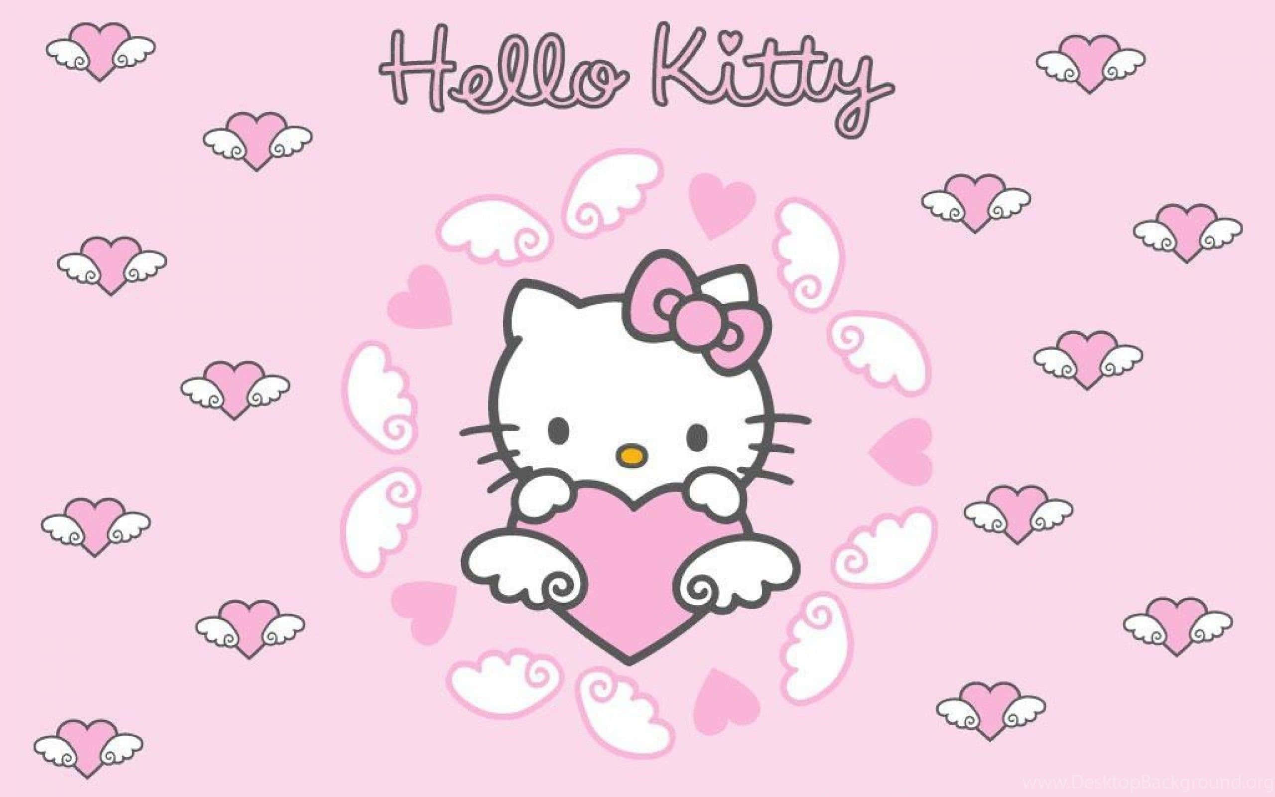 Hello Kitty 桌布 壁紙 — Hello Kitty 帶著天使翅膀，在柔和的粉紅色背景上，手持一個被漂浮的心形和翅膀包圍的粉紅色心形。