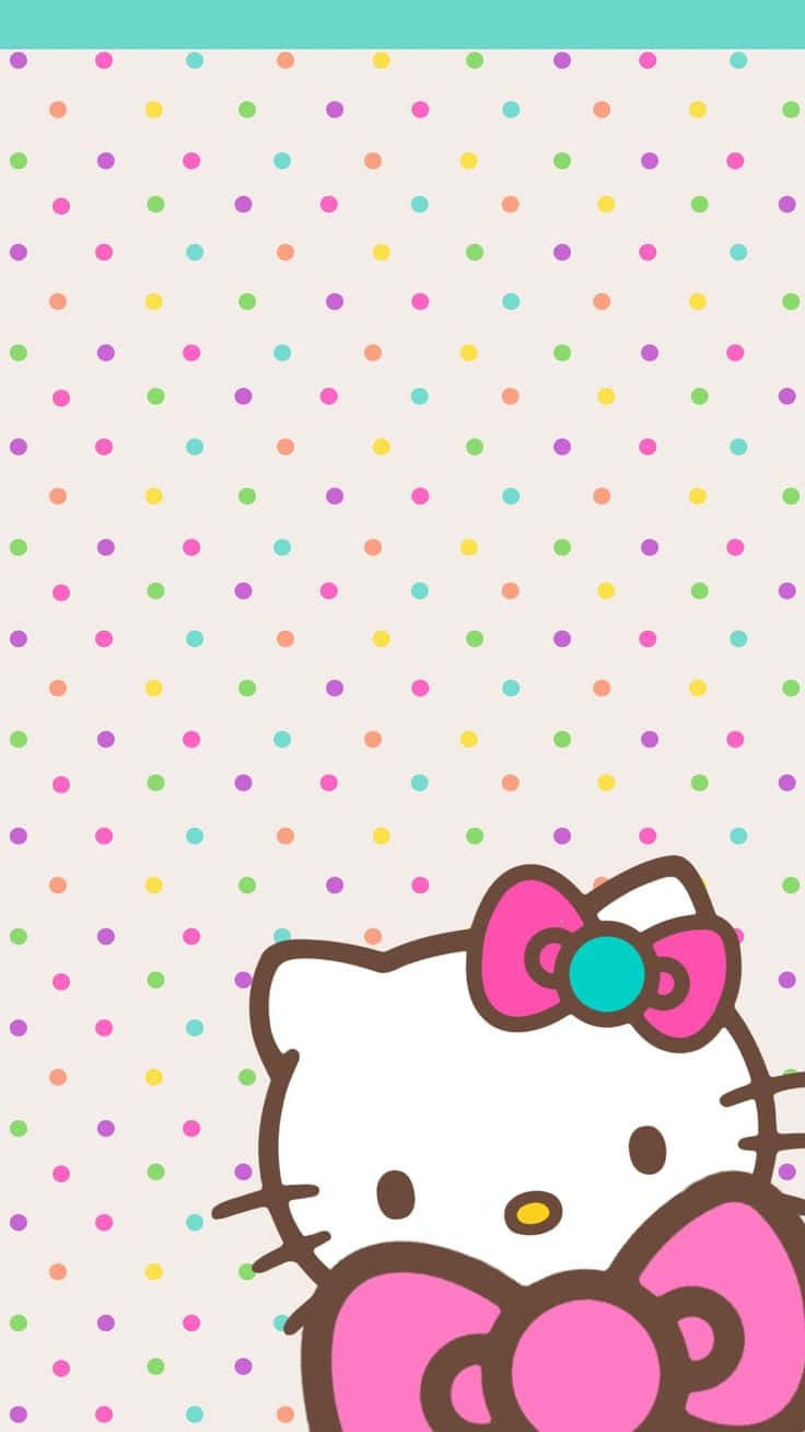 Hello Kitty 桌布 壁紙 — Hello Kitty 從右下角探出頭來，背景是帶有彩虹圓點的粉彩圓點圖案。
