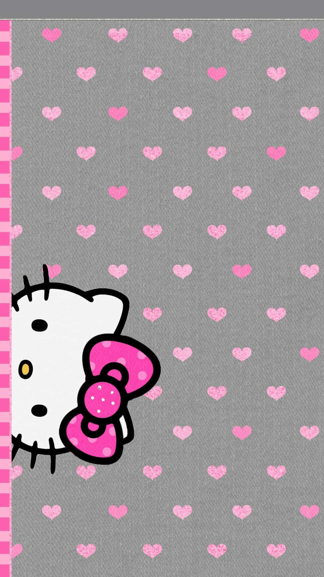 Hello Kitty 桌布 壁紙 — Hello Kitty 從粉紅色格子邊框後面探出頭來，背景是灰色，點綴著粉紅色心形。