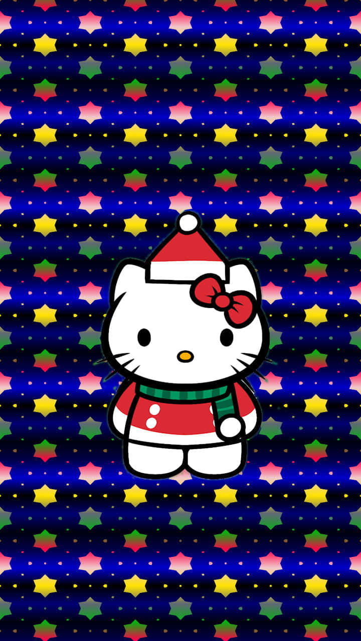 Hello Kitty Christmas 桌布 壁紙 — Hello Kitty 戴著喜慶的紅色帽子和圍巾，站在充滿活力的星空藍色背景前，背景有色彩繽紛的幾何圖案。