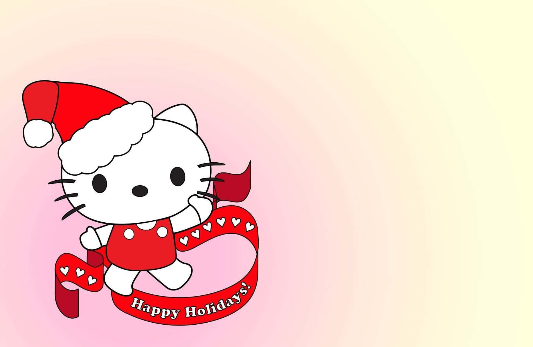 Hello Kitty Christmas 桌布 壁紙 — Hello Kitty 戴著紅色聖誕帽，手持一條帶有心形圖案和「Happy Holidays」字樣的紅色絲帶，背景是柔和的粉紅和黃色漸層。