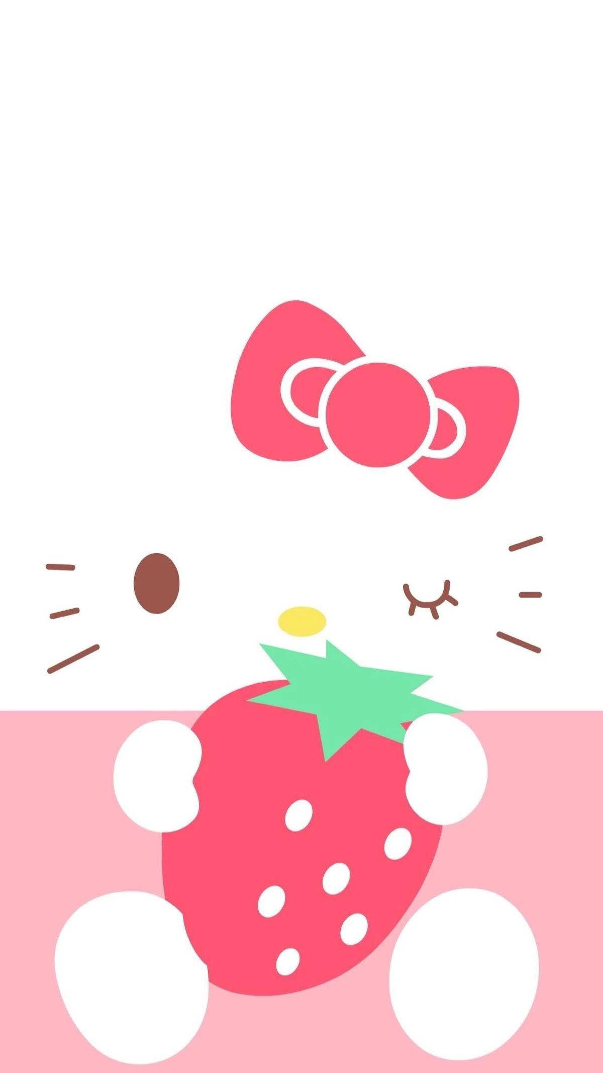 Kawaii iPhone 桌布 壁紙 — Hello Kitty 拿著一顆帶有粉紅色蝴蝶結的草莓，背景是粉紅色和白色分割的。