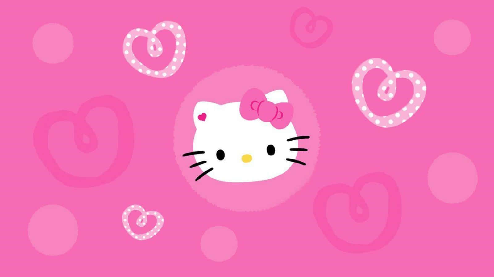 Hello Kitty Laptop 桌布 壁紙 — Hello Kitty 的笑臉，粉紅色蝴蝶結居中，背景為充滿活力的粉紅色，飾有漂浮的心形和圓形。