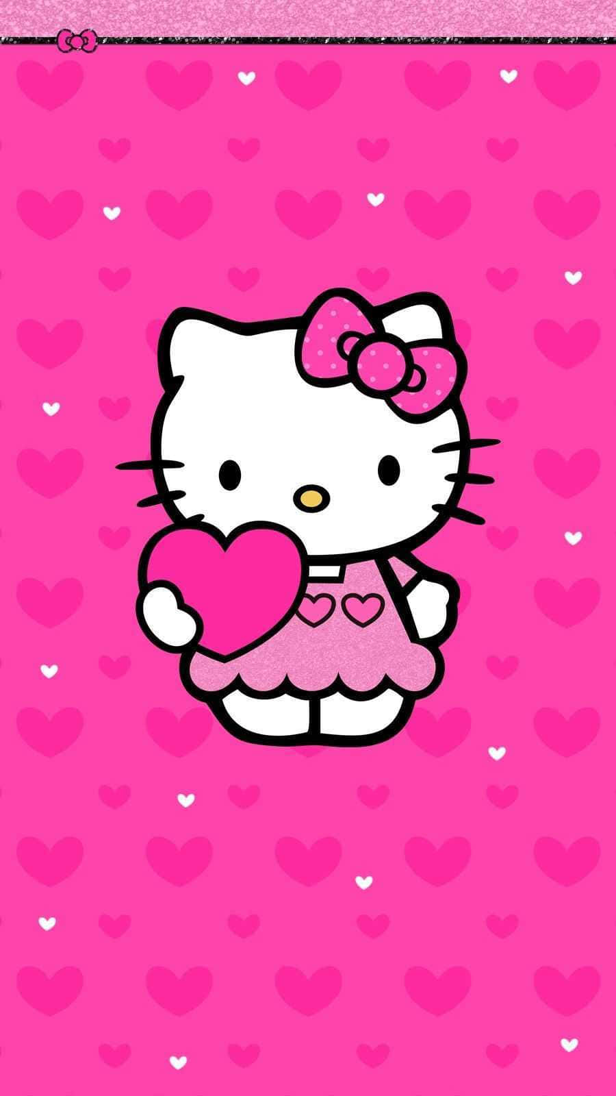 Hello Kitty Pc 桌布 壁紙 — Hello Kitty 穿著粉紅色連衣裙，在粉紅色心形圖案背景上拿著一顆心。