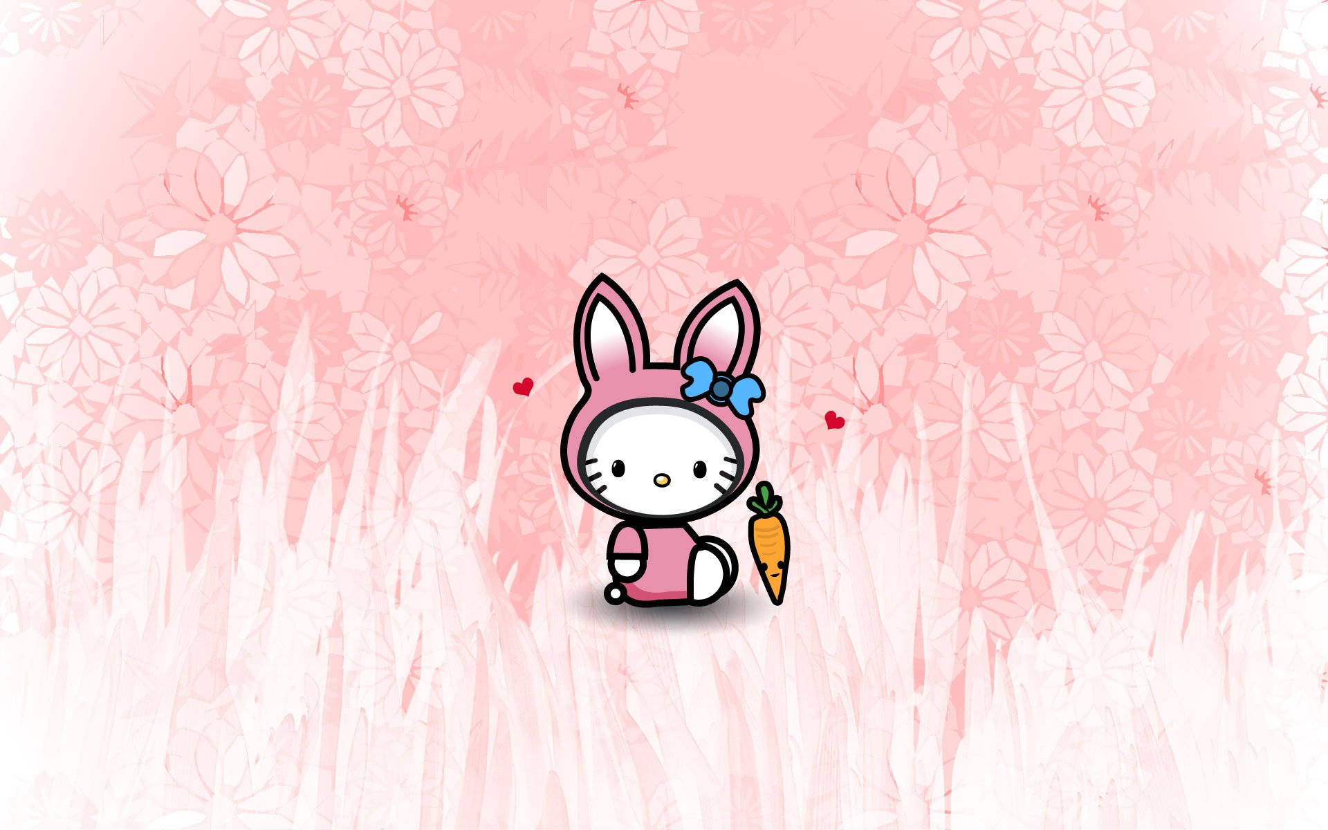 Hello 桌布 壁紙 — Hello Kitty 穿著粉紅色兔子服裝，在柔軟的粉紅色花草草地中，拿著一根胡蘿蔔，周圍有漂浮的愛心。