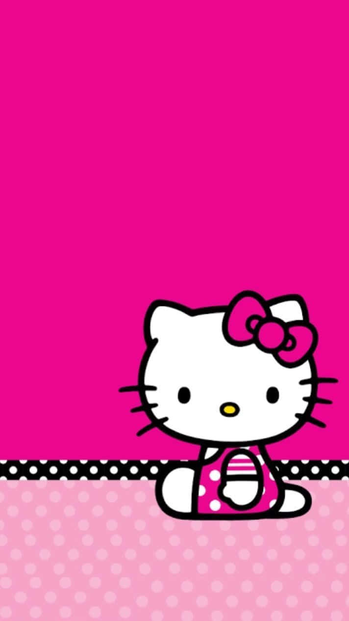Hello Kitty 卡通角色穿著粉紅色連衣裙，戴著蝴蝶結，坐在圓點地板上。 — 三麗鷗角色 GIF 壁紙
