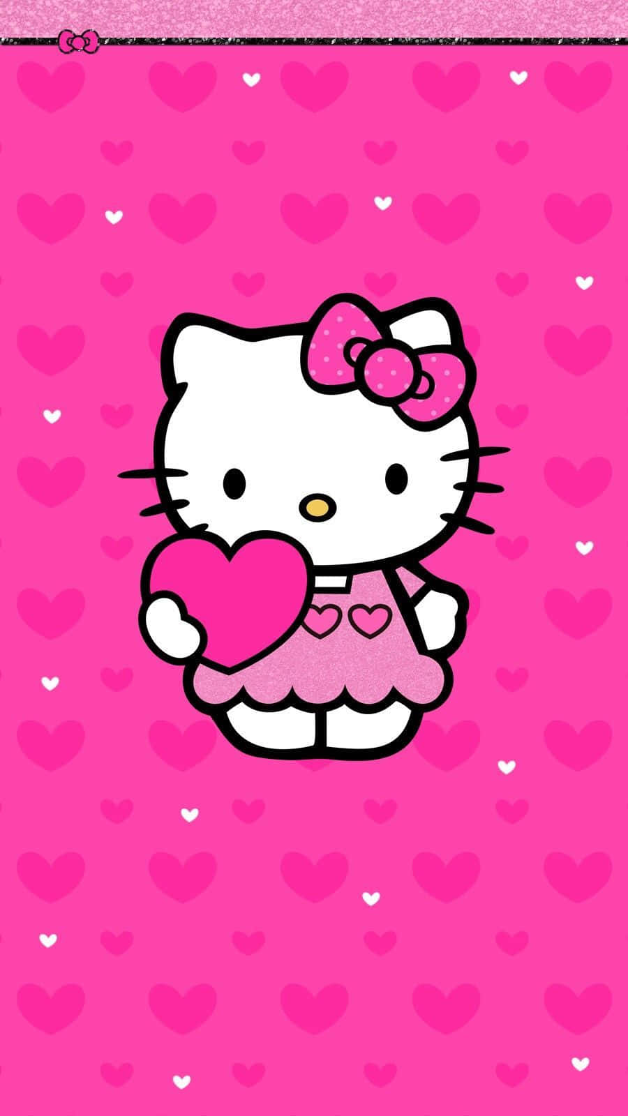 Hello Kitty 桌布 壁紙 — Hello Kitty 穿著粉紅色連衣裙，在粉紅色心形圖案背景上拿著一顆心。