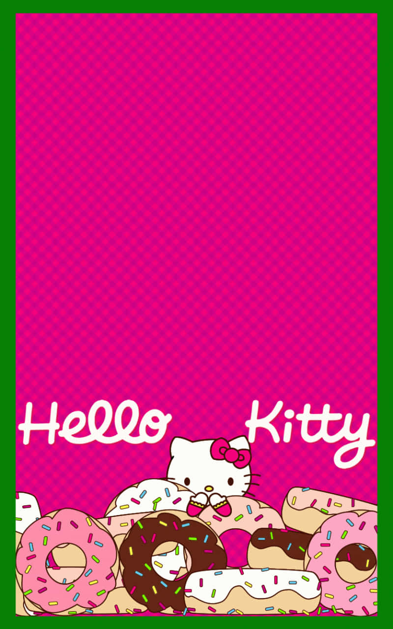 Hello Kitty 桌布 壁紙 — Hello Kitty 角色在一個亮粉紅色格子背景上，從一堆色彩繽紛的糖針甜甜圈後面探出頭來。