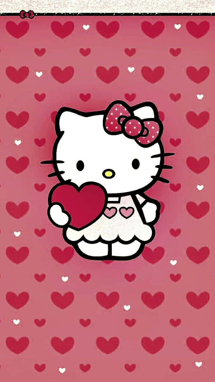桌布 壁紙 — Hello Kitty 身穿白色連衣裙，在充滿心形的粉紅色背景前手持一顆紅心。