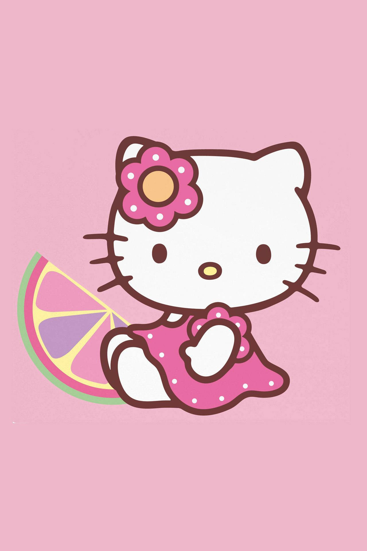 Hello 桌布 壁紙 — Hello Kitty 身穿粉紅色圓點連衣裙，在柔和的粉紅色背景上拿著色彩繽紛的柑橘片。