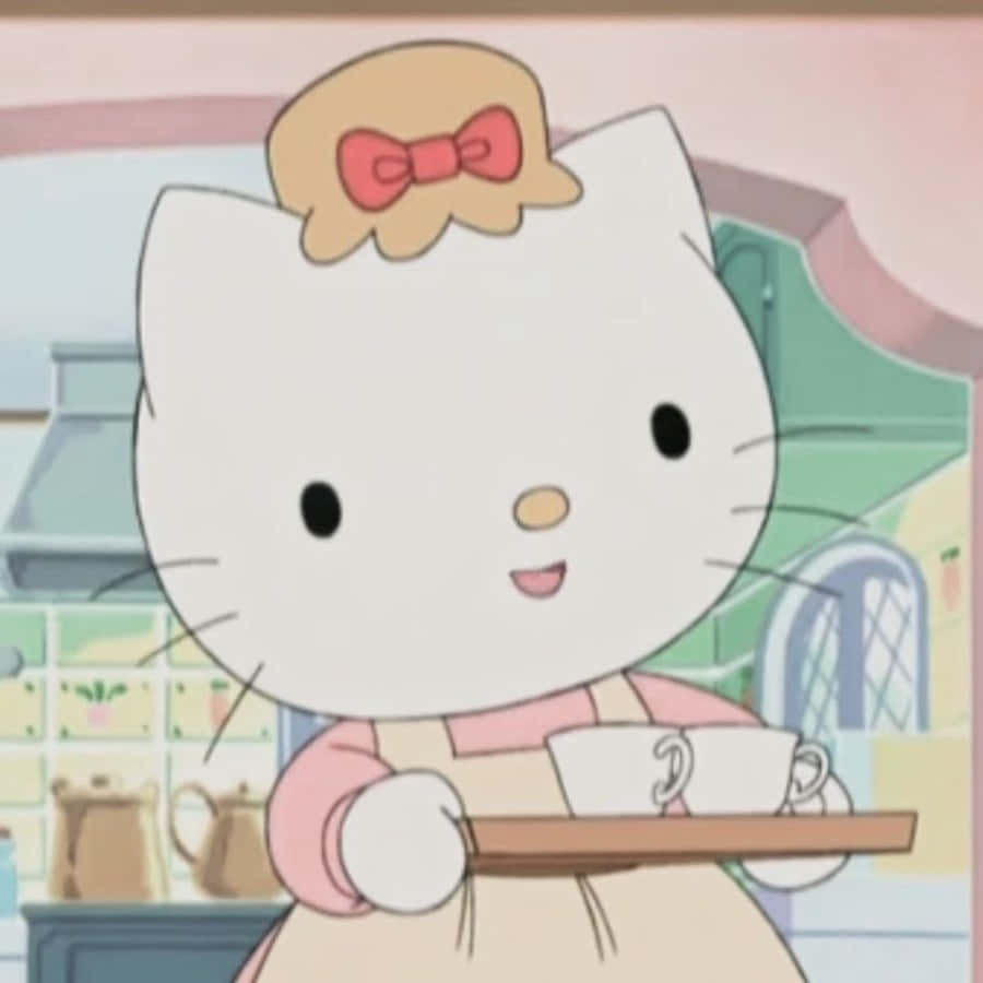 Mary White 桌布 壁紙 — Hello Kitty 身穿粉紅色圍裙，在舒適的廚房環境中帶著溫暖的笑容奉茶。