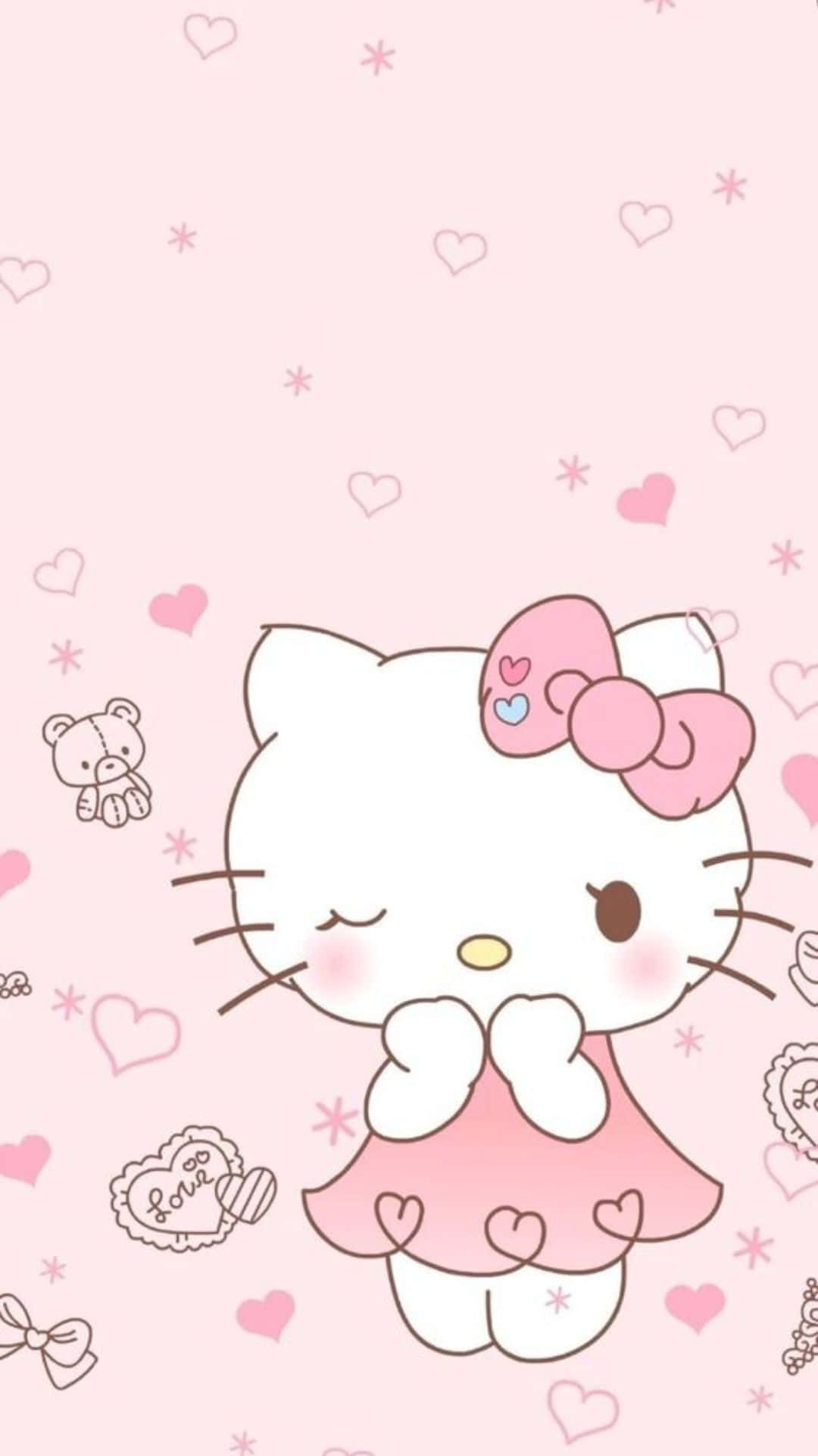Kitty White 桌布 壁紙 — Hello Kitty 身穿粉紅色連衣裙，戴著蝴蝶結，在點綴著心形和星星的粉彩粉紅色背景前輕輕祈禱。