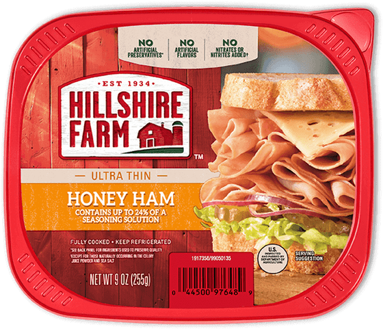 火腿 桌布 壁紙 — Hillshire Farm 蜂蜜火腿三明治的特寫，放在紅色塑膠容器中，背景為鄉村風格木紋。